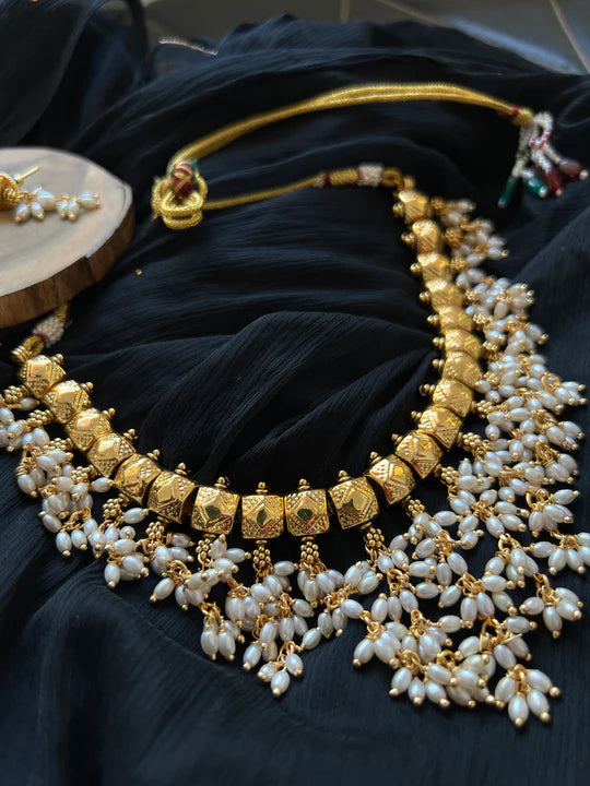 Golden matte rice pearl necklace with studs